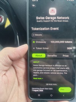 A hand holds a smartphone displaying a screen for 'Swiss Garage Network', announcing a 'Tokenization Event' with a giveaway of '100,000,000 tokens' and token ticker 'SGN'.