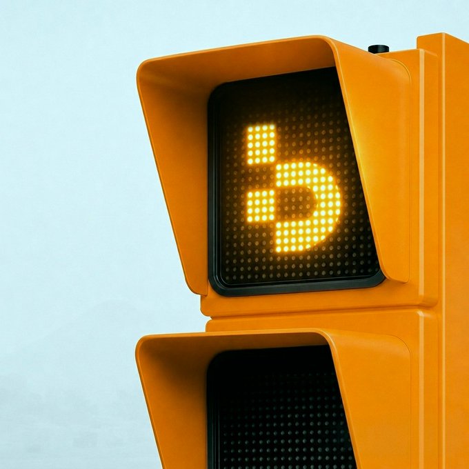 A close-up of an orange traffic signal displaying an illuminated left-turn arrow with a digital countdown timer showing the number "5" in bright yellow LEDs against a cloudy sky. The image visually represents the "green light" metaphor in the post, symbolizing an imminent opportunity or signal to proceed with action.