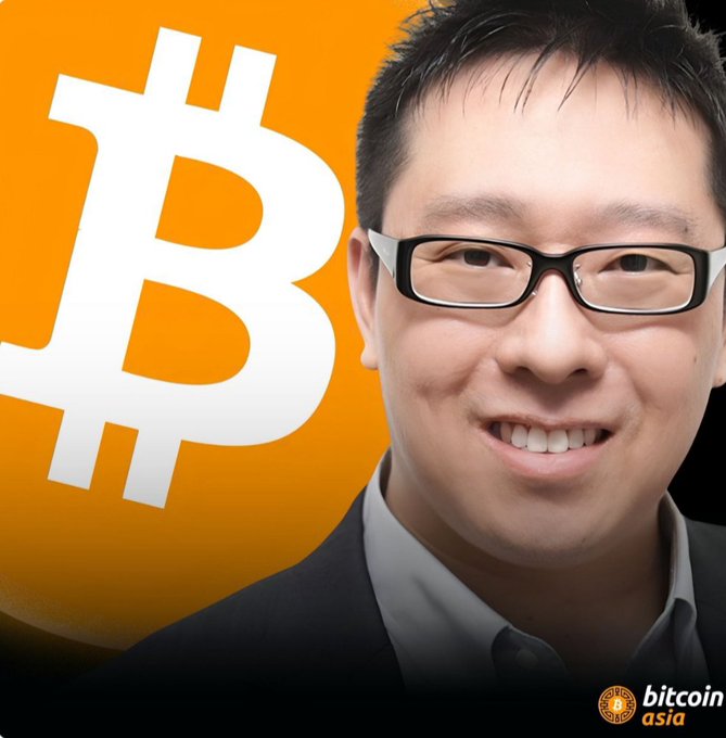The image shows a smiling man wearing glasses against a black background, with a large orange Bitcoin logo on the left and a "bitcoin asia" watermark in the bottom right corner—appearing to be Samson Mow, whose quote about fiat money printing and Bitcoin's fixed supply accompanies the graphic.