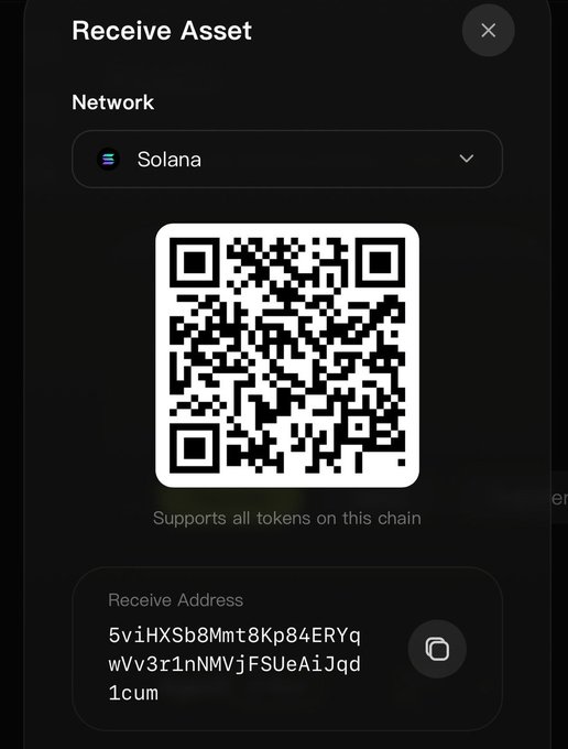 A dark mode 'Receive Asset' screen showing a Solana network QR code with the receive address '5viHXSb8Mmt8Kp84EYqwVv3r1nNMVjFSUeAiJqd1cum' and copy button.