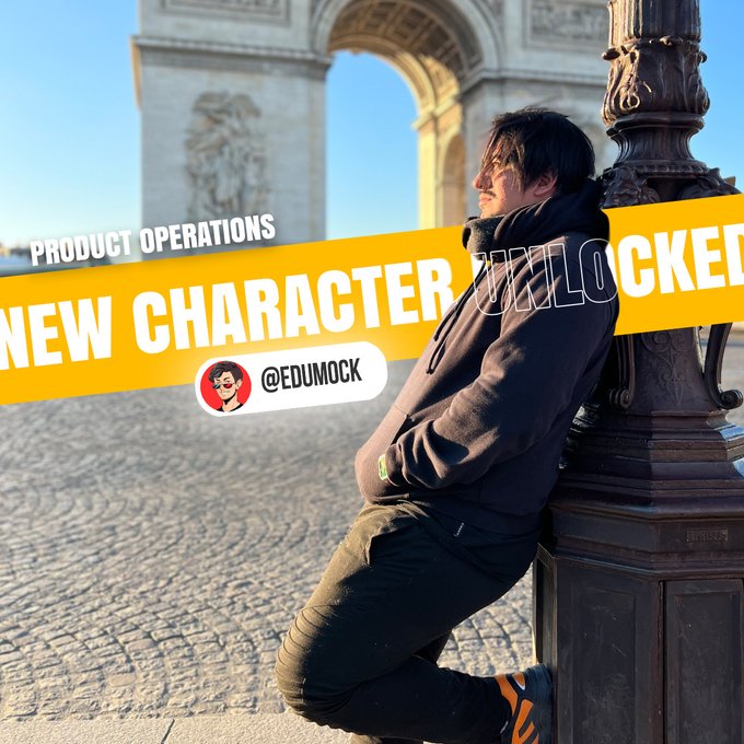 A promotional graphic showing a young man leaning against a lamppost near the Arc de Triomphe, with text reading 'PRODUCT OPERATIONS', 'NEW CHARACTER UNLOCKED', and a handle '@EDUMOCK'.