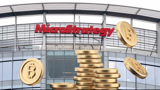 The image shows the red "MicroStrategy" company sign on a glass building facade, overlaid with illustrations of golden Bitcoin coins stacked and floating in front. This visual ties directly to the post about Strategy (MicroStrategy) shifting its strategy to actively manage its massive Bitcoin holdings rather than simply buying and holding.