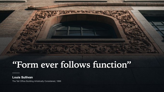An architectural photo of ornate terracotta archway with the quote 'Form ever follows function' attributed to Louis Sullivan from The Tall Office Building Artistically Considered, 1896.