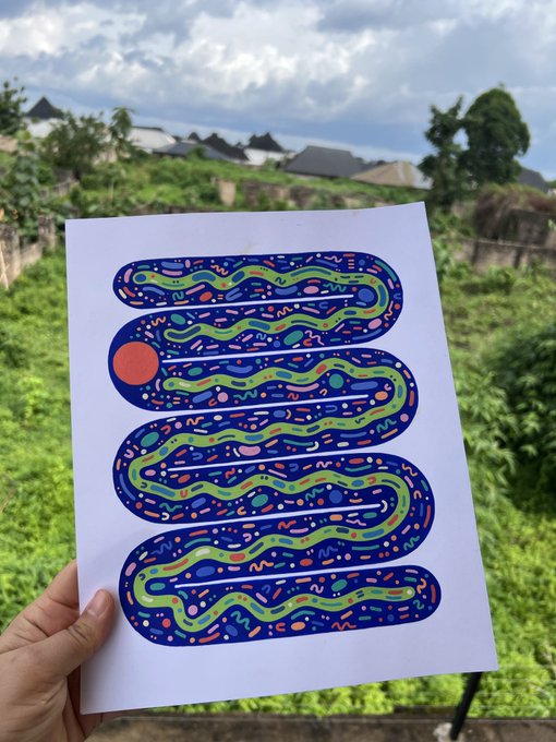 The image shows a hand holding up a piece of paper with an abstract drawing or painting featuring a snake-like pattern, possibly blue and green, with a red circle in the center. The text "gn Only one Left This is how every story starts" is also present on the image.