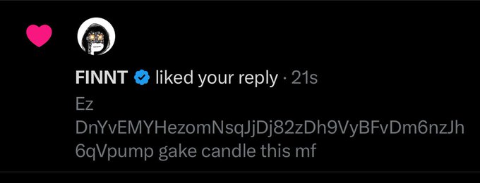 The image shows a notification from FINNT (verified) liking a reply that says "Ez" followed by a contract address "DnYvEMYHezomNsqJjDj82zDh9VyBFvDm6nzJh6qVpump" and "gake candle this mf," referencing the meme coin GAKE and connecting to the original post mocking its price action.