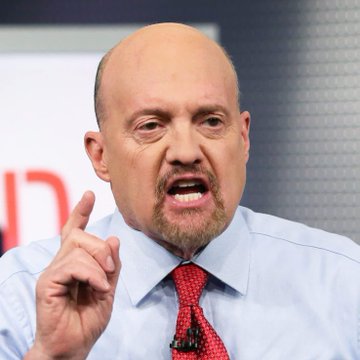 The image features a bald man wearing a blue shirt, red tie, and speaking with his hand raised as if he's making an important point or gesture. The caption below the image reads "BREAKING: Jim Cramer just said Michael Saylor has  murdered Bitcoin." This statement is likely related to the conversation taking place in the image, where a bald man wearing a blue shirt and red tie is speaking with his hand raised as if he's making an important point or gesture.