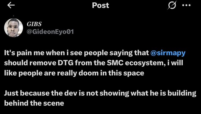 A Twitter/X post by user "GIBS" (@GideonEyo01) reads: "It's pain me when i see people saying that @sirmapy should remove DTG from the SMC ecosystem, i will like people are really doom in this space. Just because the dev is not showing what he is building behind the scene." The post supports @sirmapy's stance against community pressure to remove DTG from SMCDAO, aligning with the developer's defense of working behind the scenes without being bullied into publicly proving his development efforts.
