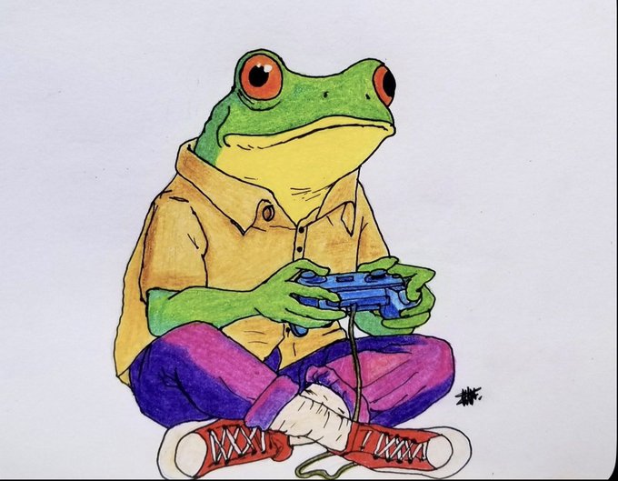 A colorful illustration of a green tree frog wearing a yellow shirt, purple pants, and red sneakers, sitting cross-legged while holding a blue game controller—representing the "ZygoFrog" mascot of the platform. The whimsical gamer imagery aligns with the post's promotion of Zygo Frog Future as a streamlined, accessible prediction market platform, using the frog character as its brand identity.