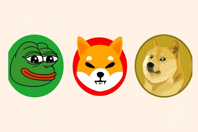 An illustration of three meme coin logos: a green Pepe the Frog, an orange Shiba Inu (Shib), and a yellow Dogecoin (Doge), arranged side by side on a cream background.