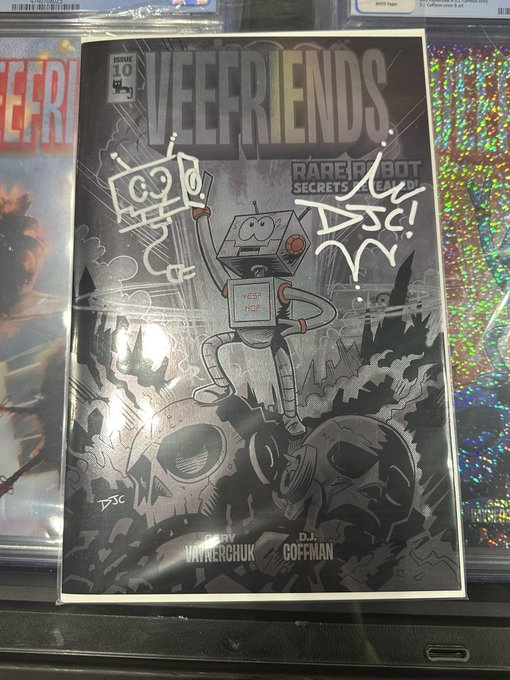 A comic book or magazine cover titled 'VEEFRIENDS ISSUE 10' features an illustrated robot character with the text 'RARE BOT SECRETS REVEALED' and credits to 'VAYNERCHUK' and 'D.J. GOFFMAN'.