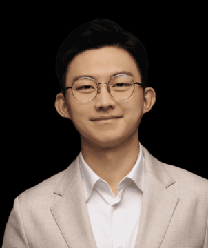 A portrait of Ki Young Ju, CEO of CryptoQuant, against a black background. The image accompanies a quote in which he predicts upcoming bullish momentum for Bitcoin, describing it metaphorically as "opium" to relieve bear market pain.