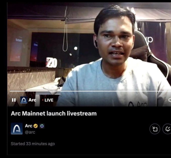 The image shows a man with dark hair in a gray shirt speaking during a live broadcast titled "Arc Mainnet launch livestream" by @arc on Twitter, which started 33 minutes prior and displays a "LIVE" indicator with a countdown showing "20." The post "Ayo... There is no mint, i love you" suggests this person is making an announcement about the Arc Mainnet launch, confirming that no mint (token mint) will occur during the event.