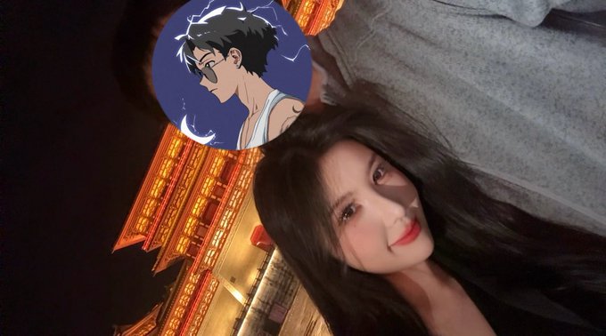 The image features a woman with long hair, wearing glasses, posing for a picture against a backdrop of an orange building at night. The photo has been edited or photoshopped to include elements from another image, which adds a creative touch to the overall composition. The caption "Today'S this BNB cousin won't be able to make you money anymore." is also present in the image, possibly indicating that someone has altered the original post for their own purposes.
