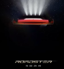 A sleek red Tesla Roadster is shown in space with headlights beaming through a starry backdrop, accompanied by the text "ROADSTER" and a countdown timer reading "19 00 29 49," teasing the roadster's journey to outer space.