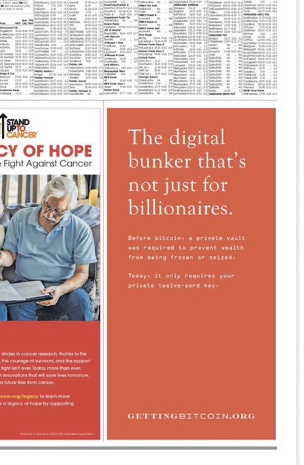 A partial view of what appears to be a public document or article featuring a 'Stand Up To Cancer' advertisement with the headline 'The digital bunker that's not just for billionaires' promoting gettingbitcoin.org.