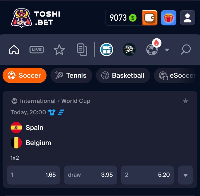 A Toshi.bet sportsbook screenshot showing an upcoming International World Cup soccer match between Spain and Belgium (today at 20:00), with 1x2 betting odds of 1.65 for Spain, 3.95 for a draw, and 5.20 for Belgium—likely shared to promote the giveaway where users can place a free $300 wager to predict the correct score.