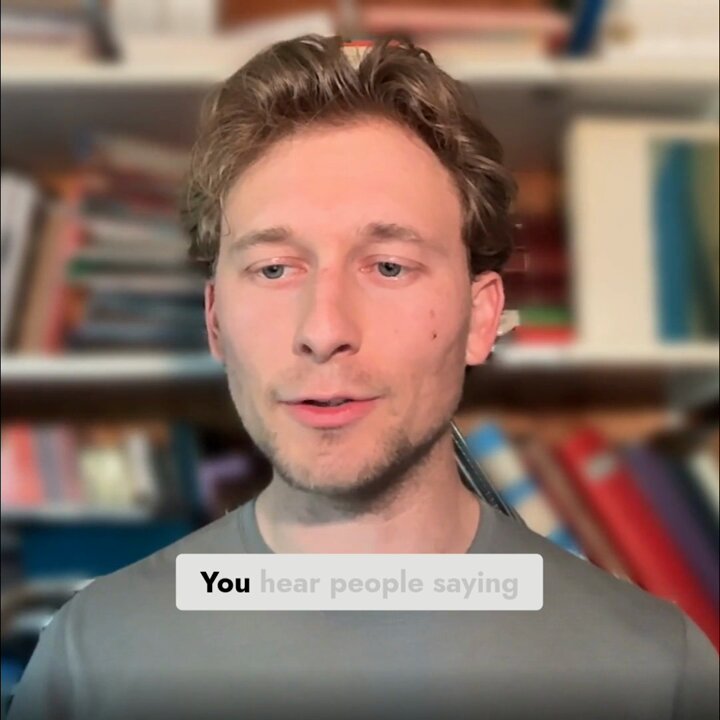 The image shows a man wearing a grey shirt with the text "You hear people saying" written above his head, possibly indicating that he has been asked to provide feedback or input from real users of a particular service or product. The context suggests that this could be related to a social media platform or an online review site where users' opinions and experiences are shared.