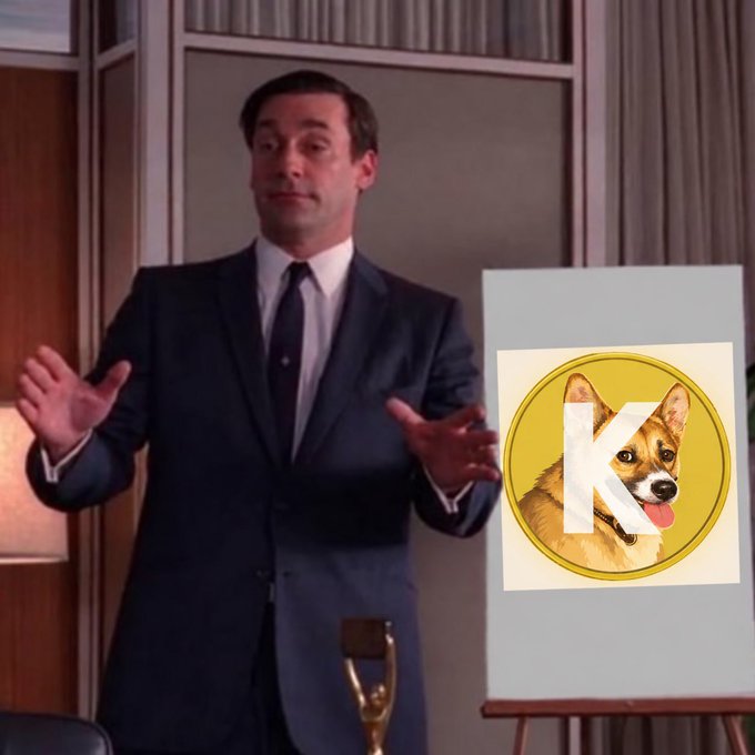 A sharply dressed man gestures expressively beside an easel displaying a "K" logo featuring a Shiba Inu dog. The image humorously pairs with the post promoting a new Shiba-themed crypto token, evoking the style of a confident pitch presentation for a "next DOGE" opportunity.