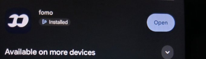 A close-up of a mobile app store interface shows the 'fomo' app as 'Installed' with an 'Open' button and text 'Available on more devices'.