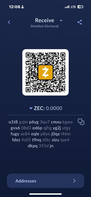 Mobile wallet screenshot showing a Zcash (ZEC) receive address with a QR code, displaying a balance of 0.0000 ZEC.