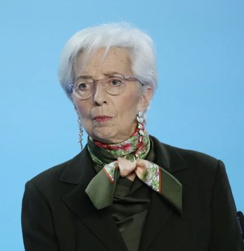 European Central Bank President Christine Lagarde, shown here wearing glasses and a green blouse with a patterned scarf, personally intervened to block cryptocurrency exchange Binance from entering the European market, according to the Wall Street Journal.