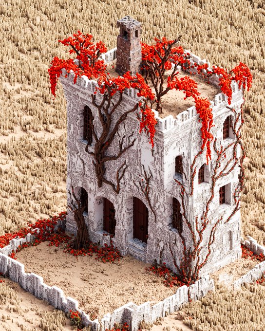 A miniature stone tower or building covered in bright red vines and leaves, set in a sandy landscape.