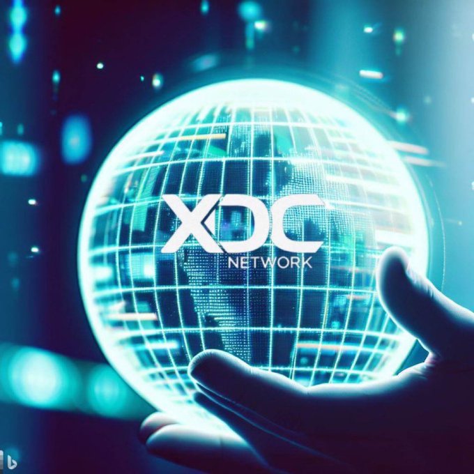 A glowing blue holographic globe displaying "XDC NETWORK" is held in an outstretched hand, visually reinforcing the post's message about XDC Network's widespread global adoption, as highlighted by its 2.16M wallet users surpassing ONDO, AAVE, and QNT combined.