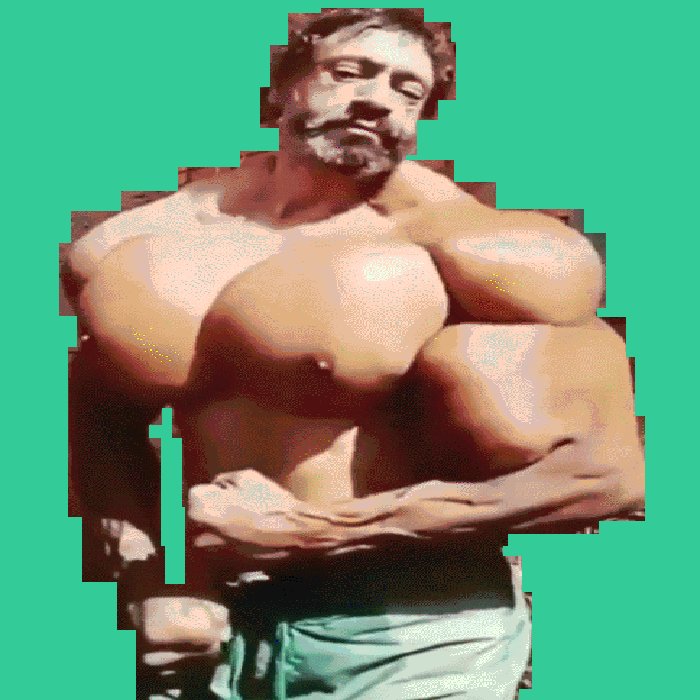 The image features a muscular man with large biceps, flexed at the elbows, posing for a picture against a green background. The photo has been edited or photoshopped to create an interesting visual effect by placing the man's face in the center of the image and making him appear as if he is wearing a mask. This creative alteration gives the impression that the man is wearing a mask while flexing his muscles, adding a unique and intriguing element to the photo.