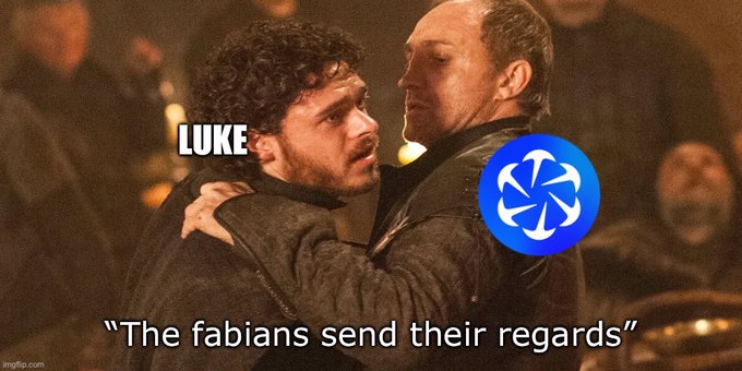 A meme featuring a scene from Game of Thrones with two characters embracing; one is labeled 'LUKE' and a blue rotating icon is overlaid, with the caption 'The fabians send their regards'.