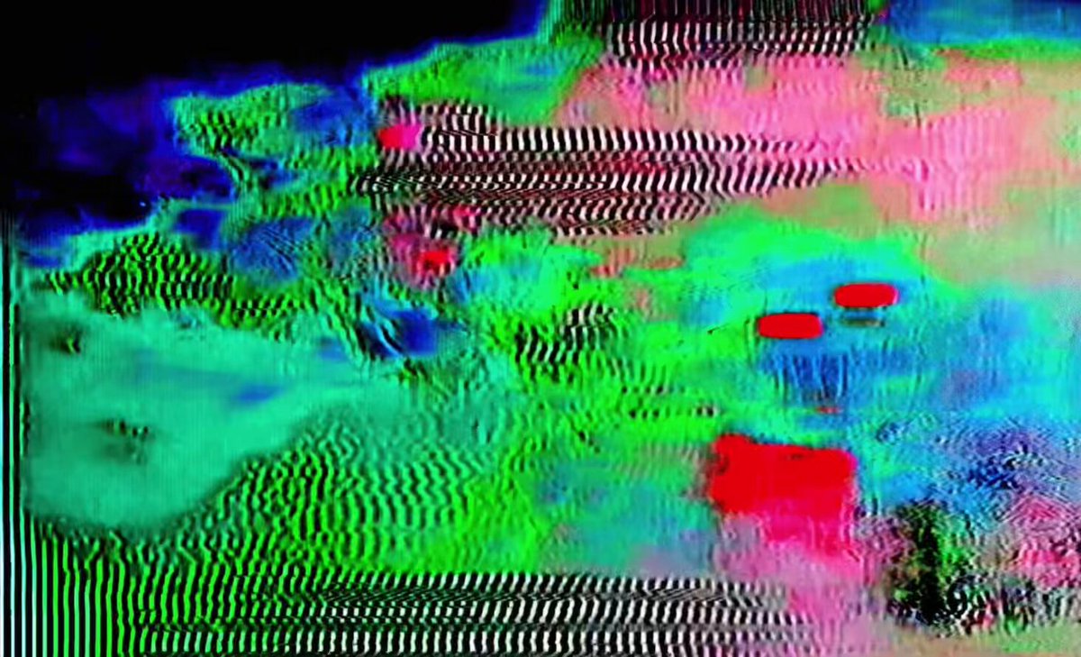 The image features a painting with a green background, which appears to be a digital art piece. The colors used are predominantly green, red, and blue, creating an abstract and colorful composition. The painting has a fuzzy appearance due to the use of a fuzzy photo filter or enhancement applied to it. The post is titled "GM ∫↳♗ᗰ€☈ สมายเรียง" which translates to "I love you".
