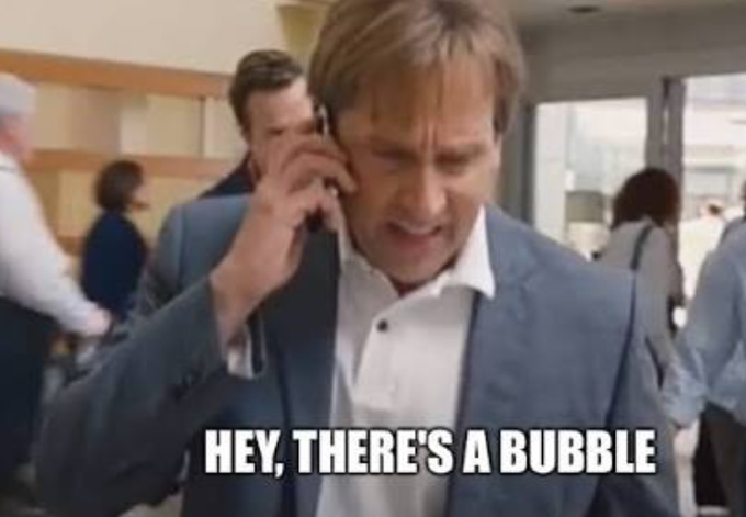 A meme shows actor Ben Affleck on a phone call with the text 'HEY, THERE'S A BUBBLE' overlaid at the bottom.