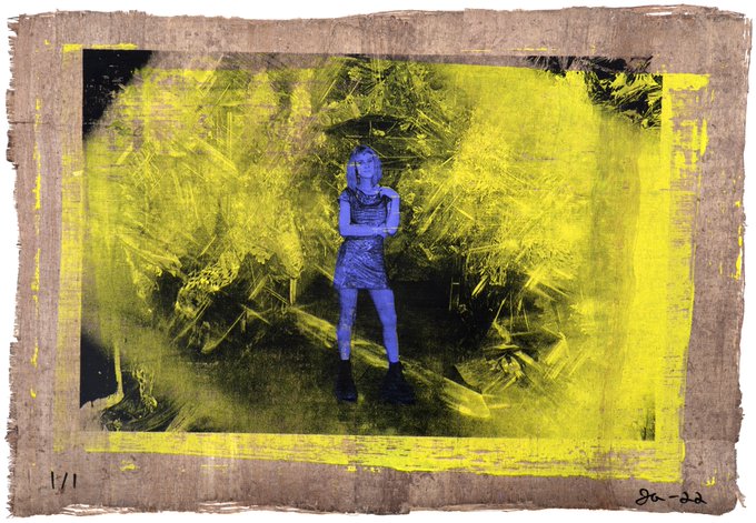 An artistic print or painting featuring a blue-tinted figure wearing a mask and tank top standing against a textured yellow and brown background, with a date '8-26' signed in the corner.