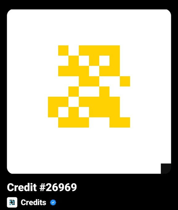 A pixelated yellow creature design displayed on a white background, labeled 'Credit #26969' from the 'Credits' verified collection.