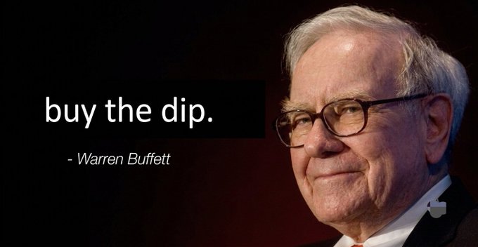 An inspirational quote graphic featuring a portrait of investor Warren Buffett alongside the famous advice 'buy the dip.' attributed to him.
