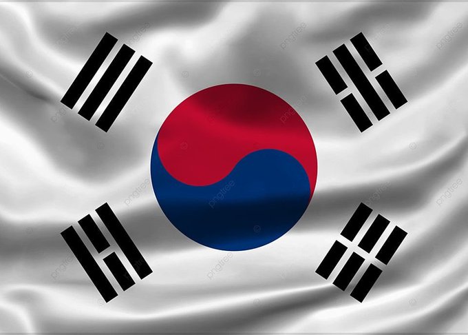 Flag of South Korea featuring a white background with a red and blue taegeuk symbol in the center and four black trigrams in the corners.