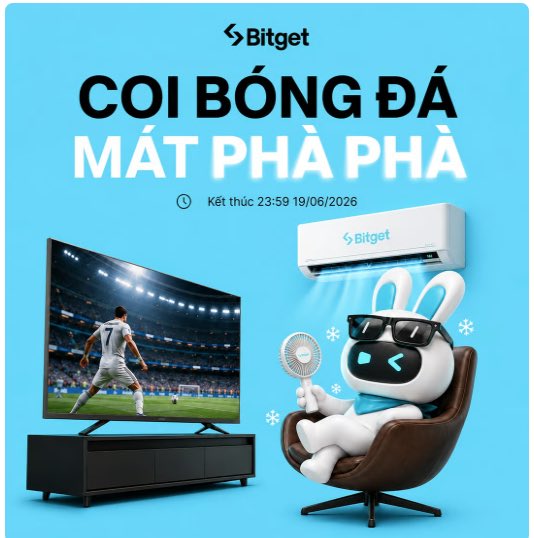 The image features a cartoon rabbit sitting in a brown chair, with a large flat screen TV displaying soccer players playing in front of him. The scene also includes a small fan placed next to the rabbit's feet. The background of the image has text that reads "Xem Bóng Đá, Nhận Máy Lạnh Bitget Việt Nam dạo này nóng như cái lò, xem bóng đá giúp anh em vừa theo dõi". The image is related to a post on Bitget's website that features a cartoon rabbit sitting in a chair and watching soccer players play.