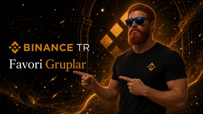 A bearded man wearing blue sunglasses and a black t-shirt featuring the Binance logo points toward text that reads "BINANCE TR - Favori Gruplar" against a dramatic dark background with glowing orange accents and the Binance logo, visually promoting the new Favorite Groups feature in the Binance TR 4.4.0 app update.