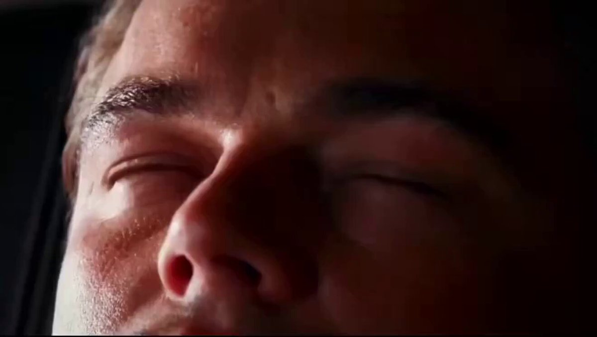 The image shows a close-up of a man's face with his eyes closed. The photo has been edited or filtered to emphasize the eye area, making the viewer focus solely on the subject's eyes. This could be an advertisement for a product or service related to eye care and vision enhancement.