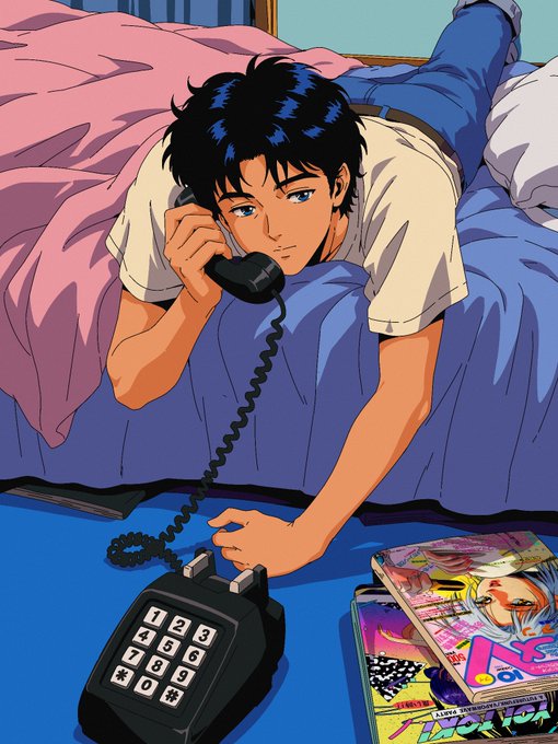 A young man with dark hair lies on a bed talking on a black rotary phone, surrounded by colorful anime magazines, with a blue carpet and pink comforter in the background. The image evokes a nostalgic 90s anime aesthetic, fitting for the community's excitement about the upcoming Mint Day release on July 10.