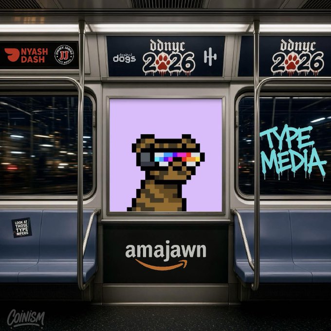 A subway car advertisement displaying a pixelated brown bear with TV-color test bar glasses on a purple background, with 'TYPE MEDIA' graffiti and an 'amajawn' logo.