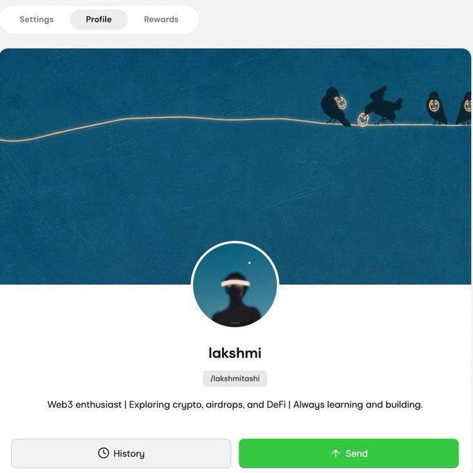 A screenshot of a Send app profile page for user "lakshmi" (/lakshmiitashi), a self-described "Web3 enthusiast | Exploring crypto, airdrops, and DeFi," featuring an artistic blue cover image with silhouetted birds on a wire, a circular profile photo, and History and Send action buttons. The image directly illustrates the accompanying post showcasing the user's Send profile as they join the Web3 community.