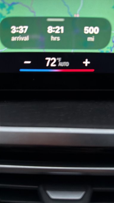 A car dashboard display shows navigation info indicating a 3:37 arrival, 8:21 hrs of travel, and 500 miles, with the climate control set to 72°F AUTO.