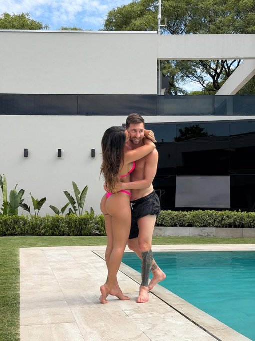 Lionel Messi and a woman in a pink bikini are embracing and kissing by a swimming pool. The image illustrates the accompanying post's comment on Messi's taste for "better things."
