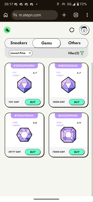 The image shows a cell phone screen displaying four different pictures of purple gemstones, each with a price tag attached to them. The screen also has a search bar at the top that allows users to find specific items they are looking for. The text on the screen reads "OMSTEPN.COM" and "Gems".