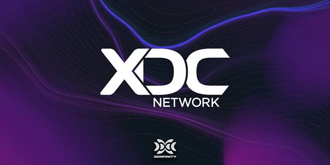 A logo graphic for XDC Network displayed in white text on a purple and blue gradient background, with the Genfinity logo below.