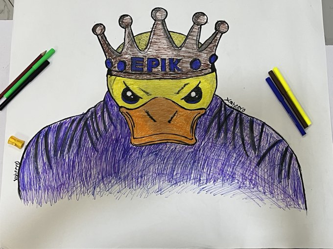 A hand-drawn artwork of a fierce-looking yellow duck wearing a gray crown with "EPIK" written on it and a purple feathered cloak, surrounded by colored markers on the paper.