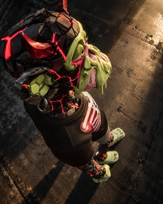 A 3D rendered or video game screenshot of a character with green skin, a cracked black helmet with glowing red cracks, and a green and black outfit, possibly from a stylized game.