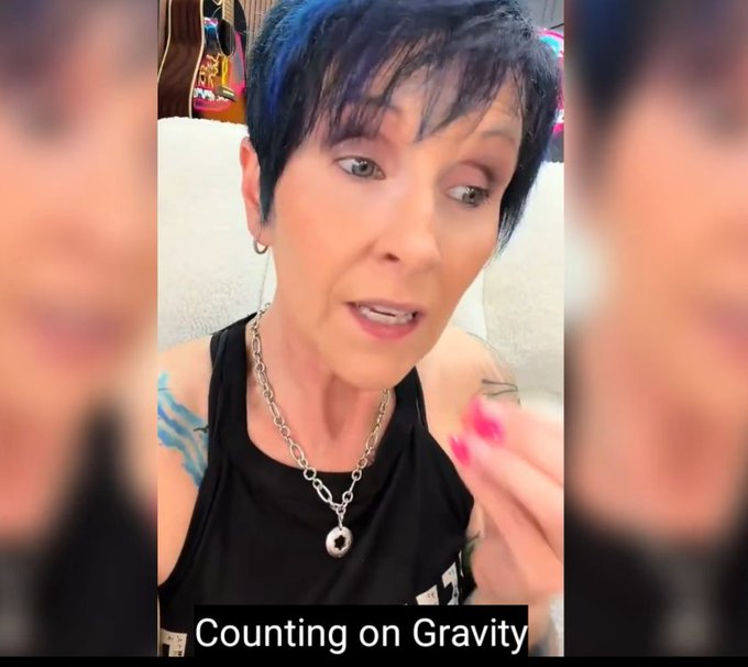 A woman with short blue hair and a black tank top speaks directly to the camera, with the caption "Counting on Gravity" displayed at the bottom of the image. The context suggests the post references the book *Counting on Gravity* and uses a meme-style format to humorously claim that "gravity coins appear after the gravity hoax," poking fun at conspiracy theories about gravity.