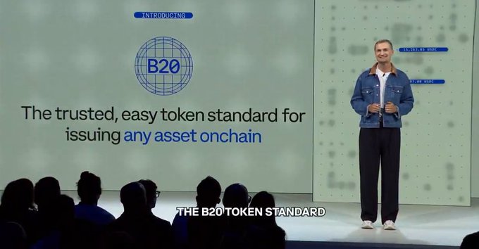 A man presenting on stage with a slide introducing 'B20' as 'The trusted, easy token standard for issuing any asset onchain', captioned 'THE B20 TOKEN STANDARD'.