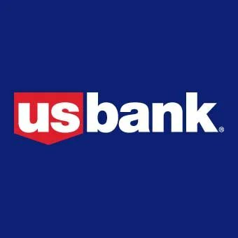 The image shows the U.S. Bank logo, featuring white "us bank" text on a red shield-shaped background set against a dark blue field. It serves as a visual identifier for the bank mentioned in the post about their successful cross-border stablecoin (USBDC) transaction on the Stellar network.